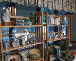 More has been added to these shelves in the kitchen area.