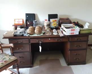 You can tell it's an office because of that big honking desk right there.