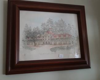 Picture in the dining room next to the china cabinet. 