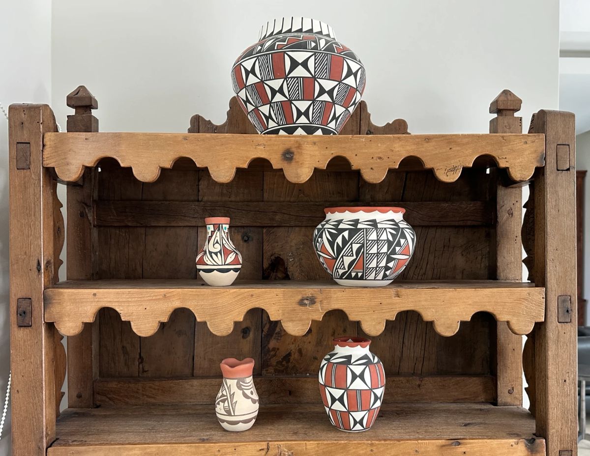 The 5 pieces of pottery are sold.