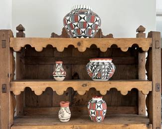 The 5 pieces of pottery are sold.