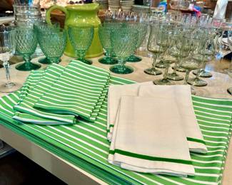 The green and white placemats and napkins are sold.