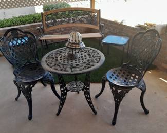 Black cast iron round table and chairs- 25"round x 26" chairs-15x35
