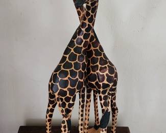 Carved giraffe statues