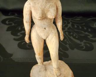 Nude wood carving