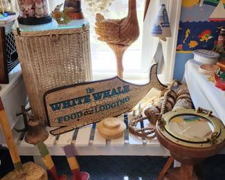 Lots of great nautical décor including lobster buoys, port hole table, and more!