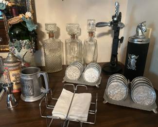 Lots of barware and bar glasses.