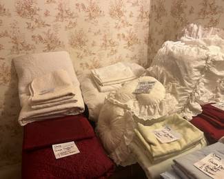 lots of sheets, comforters and blankets