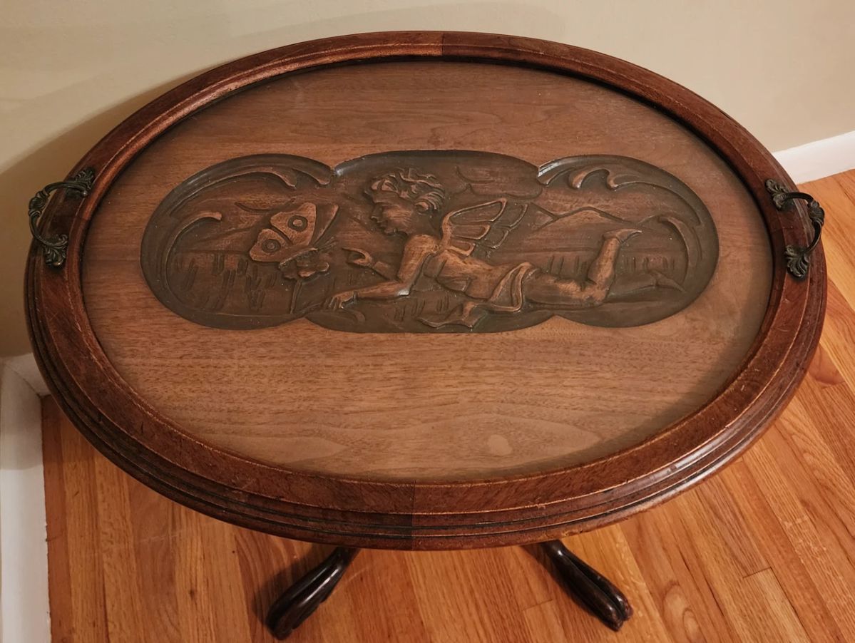 Carved relief fairy with butterfly antique tray table