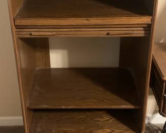 Roll down storage cabinet