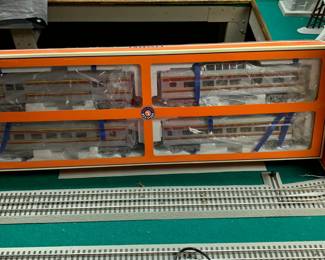 Amazing collection of Lionel Trains and other Electric Train cars and accessories. Most new in box. 