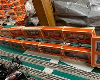 Amazing collection of Lionel Trains and other Electric Train cars and accessories. Most new in box. 