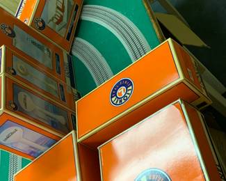 Amazing collection of Lionel Trains and other Electric Train cars and accessories. Most new in box. 