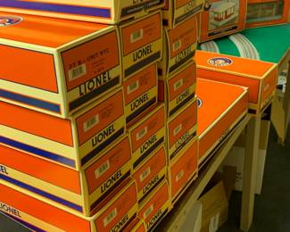 Amazing collection of Lionel Trains and other Electric Train cars and accessories. Most new in box. 