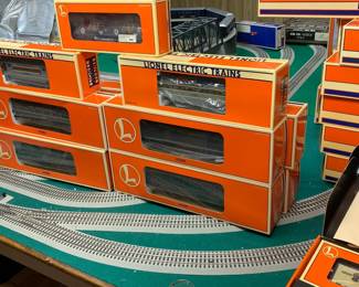 Amazing collection of Lionel Trains and other Electric Train cars and accessories. Most new in box. 