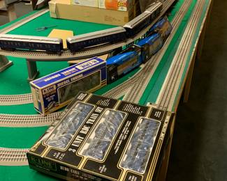 Amazing collection of Lionel Trains and other Electric Train cars and accessories. Most new in box. 