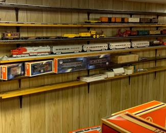 Amazing collection of Lionel Trains and other Electric Train cars and accessories. Most new in box. 