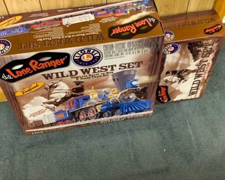Amazing collection of Lionel Trains and other Electric Train cars and accessories. Most new in box. 