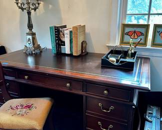 Slight leather-topped keyhole desk. Excellent condition.