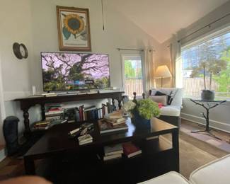 Assorted books, Basilius Besler, Hortus Eystettensis 1613 NY Botanical Gardens Print in gold-leaf frame under museum glass.