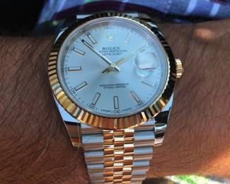 Rolex Medium sized Date Just with 18k gold bezel and Jubilee bracelet.