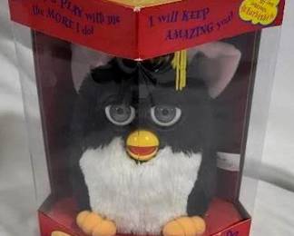 4009 - '99 Tiger Electronics Special Edition Furby - NEW Electronic Graduation Furby You are buying a used as-is electric/electronic item. We do not guarantee all components are present, and if it is not expressly stated, it is untested.
