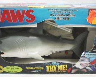 587 - Jaws Singing/Dancing Shark (New in Box) You are buying a used as-is electric/electronic item. We do not guarantee all components are present, and if it is not expressly stated, it is untested.
