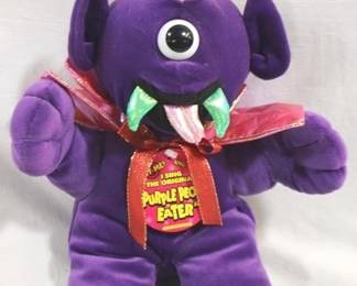 604 - Purple People Eater Singing Figure You are buying a used as-is electric/electronic item. We do not guarantee all components are present, and if it is not expressly stated, it is untested.
