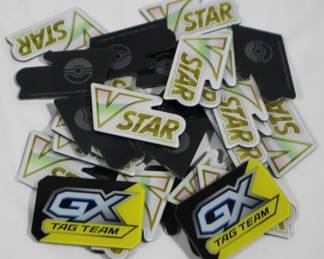 5996 - 26 Hard Plastic Pokemon Emblems
