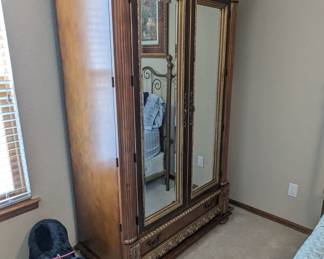 Pulaski mirror front armoire with gilded gold accents