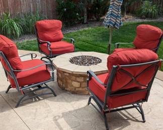 Metal patio chairs and umbrella