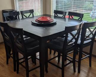 9-piece dining set: black solid wood table and 8 chairs