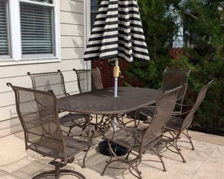 Patio table, chairs and umbrella