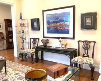 Widdicomb console, Chippendale chairs, Alebrijes and photograph by Thomas Mangelsen