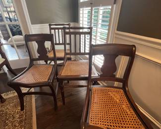 Six vintage cane seat chairs with 3 each of different back designs 