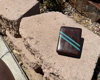 (4)         $35.             Turquoise & Wood Belt Buckle       