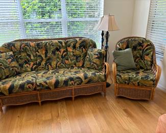 No more heavy dark mahogany stuff that weighs more than your golf cart.  Light weight rattan for when she wants to rearrange it weekly. 