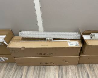 FOUR (4) bathroom light fixtures by Hinkley $250.00 each 