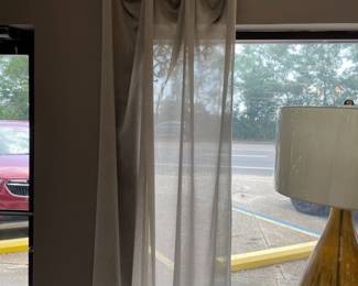 Pair of sheer panels with wall mounts $400 for all.