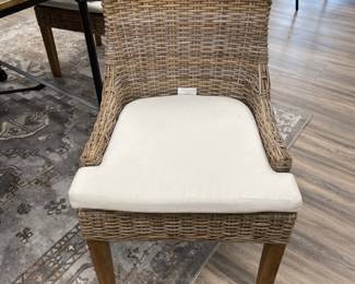 Jeffan rattan dinning chairs (5) with washable cushion covers USED.  $100.00 each