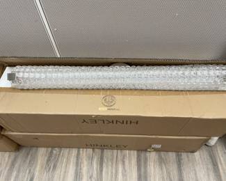 FOUR (4) bathroom light fixtures by Hinkley $250.00 each 