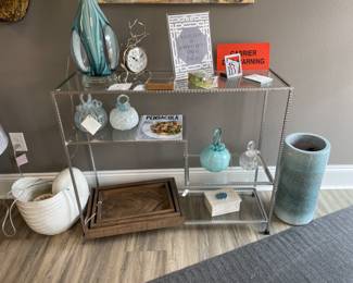 Global View chrome and glass multi shelf console.  $500