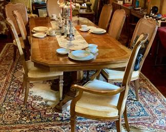Dining room table with 8 chairs, also has 2 leaves