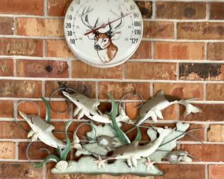 Thermometer and dolphin wall plaque