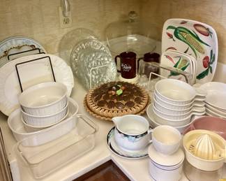 Corning ware, plates, serving ware. Covered pie dish has been pulled by estate