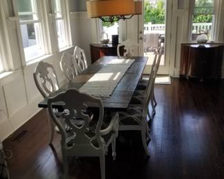 Elegant dining table seats 8; shown with leaves extended. Table is 7 1/2 ft. long x 36" wide