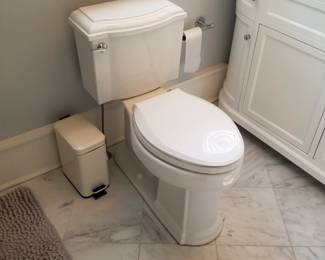 Updated comfort height commode