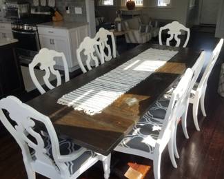 Elegant dining table seats 8; shown with leaves extended. Table is 7 1/2 ft. long x 36" wide