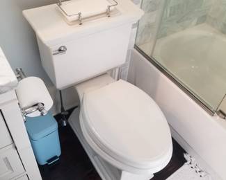 Updated comfort height commode