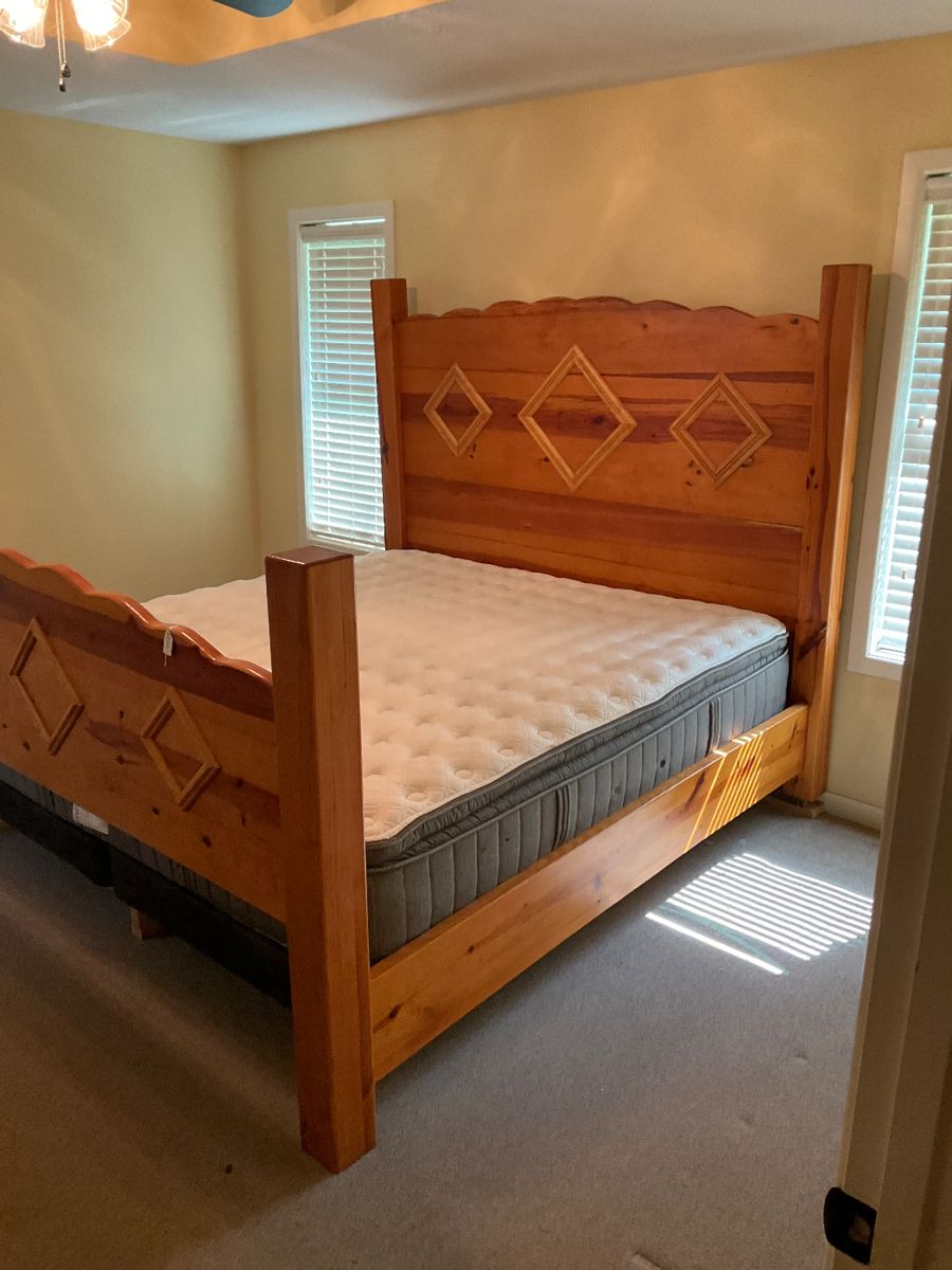 Custom made Cedar bed (King Size) with new mattress and foundation.